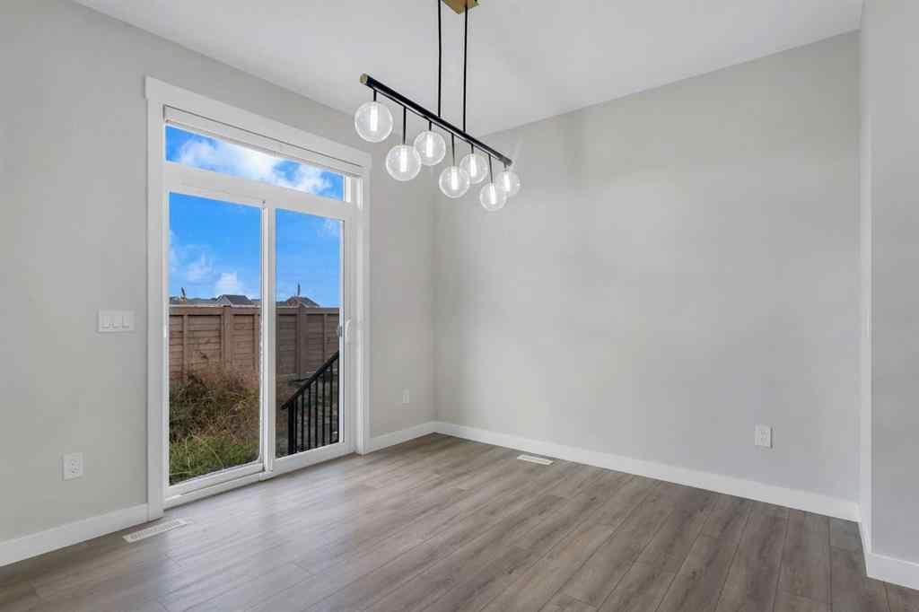 MLS® A2264996 - 592 Savanna Crescent NE in Saddle Ridge Calgary, Residential