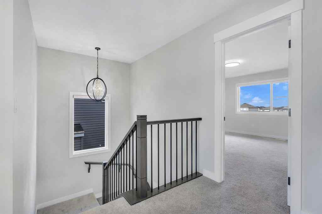 MLS® A2264996 - 592 Savanna Crescent NE in Saddle Ridge Calgary, Residential
