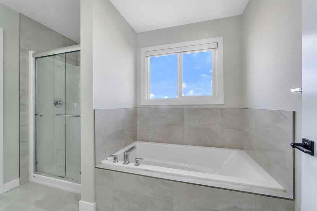 MLS® A2264996 - 592 Savanna Crescent NE in Saddle Ridge Calgary, Residential