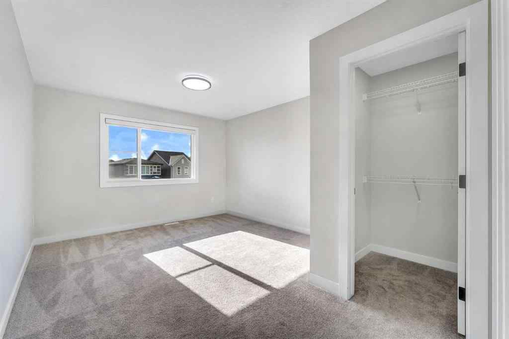 MLS® A2264996 - 592 Savanna Crescent NE in Saddle Ridge Calgary, Residential