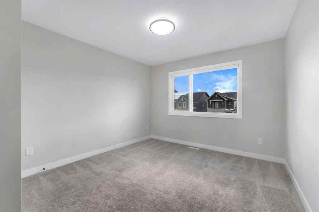 MLS® A2264996 - 592 Savanna Crescent NE in Saddle Ridge Calgary, Residential