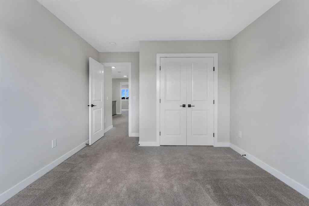 MLS® A2264996 - 592 Savanna Crescent NE in Saddle Ridge Calgary, Residential