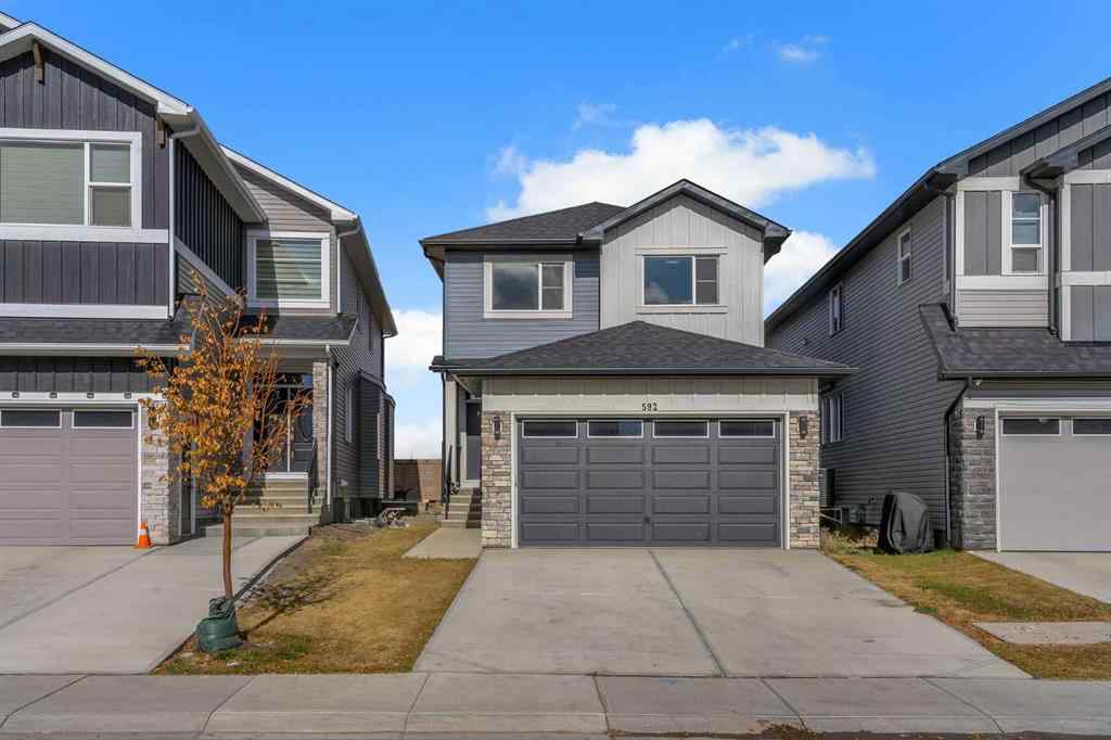 MLS® A2264996 - 592 Savanna Crescent NE in Saddle Ridge Calgary, Residential