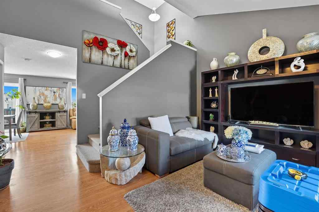 MLS® A2265001 - 824 Luxstone Square SW in Luxstone Airdrie, Residential