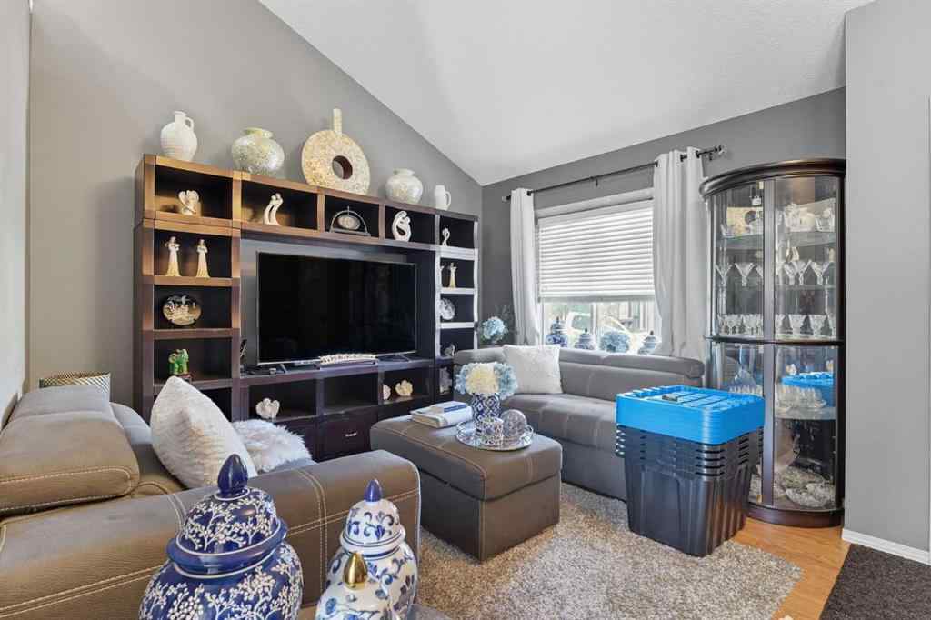 MLS® A2265001 - 824 Luxstone Square SW in Luxstone Airdrie, Residential