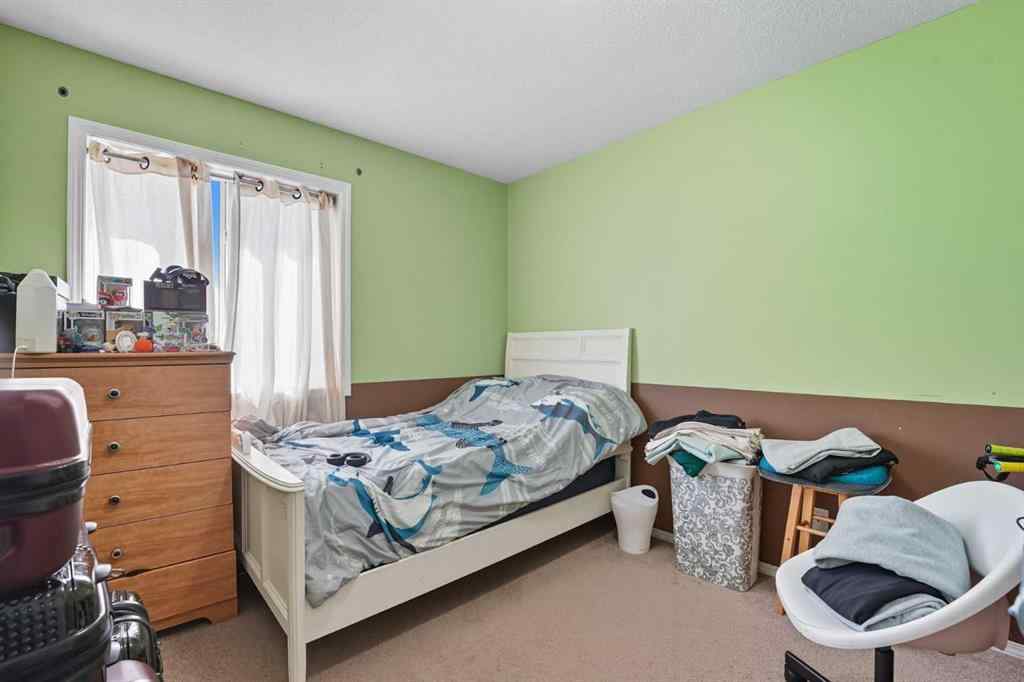 MLS® A2265001 - 824 Luxstone Square SW in Luxstone Airdrie, Residential