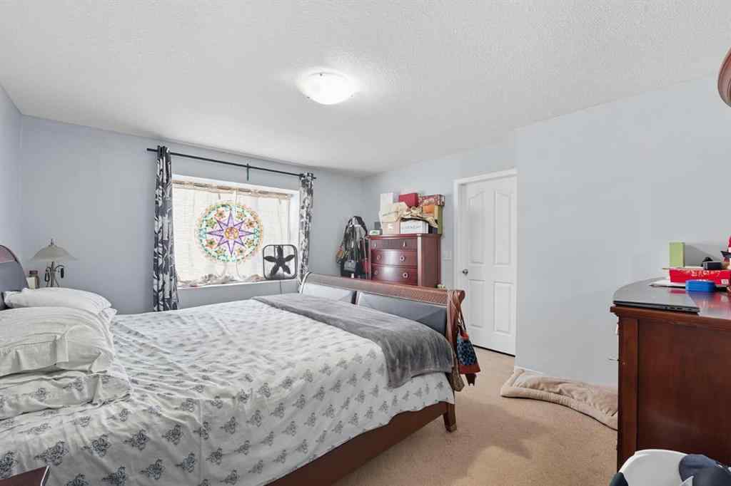 MLS® A2265001 - 824 Luxstone Square SW in Luxstone Airdrie, Residential