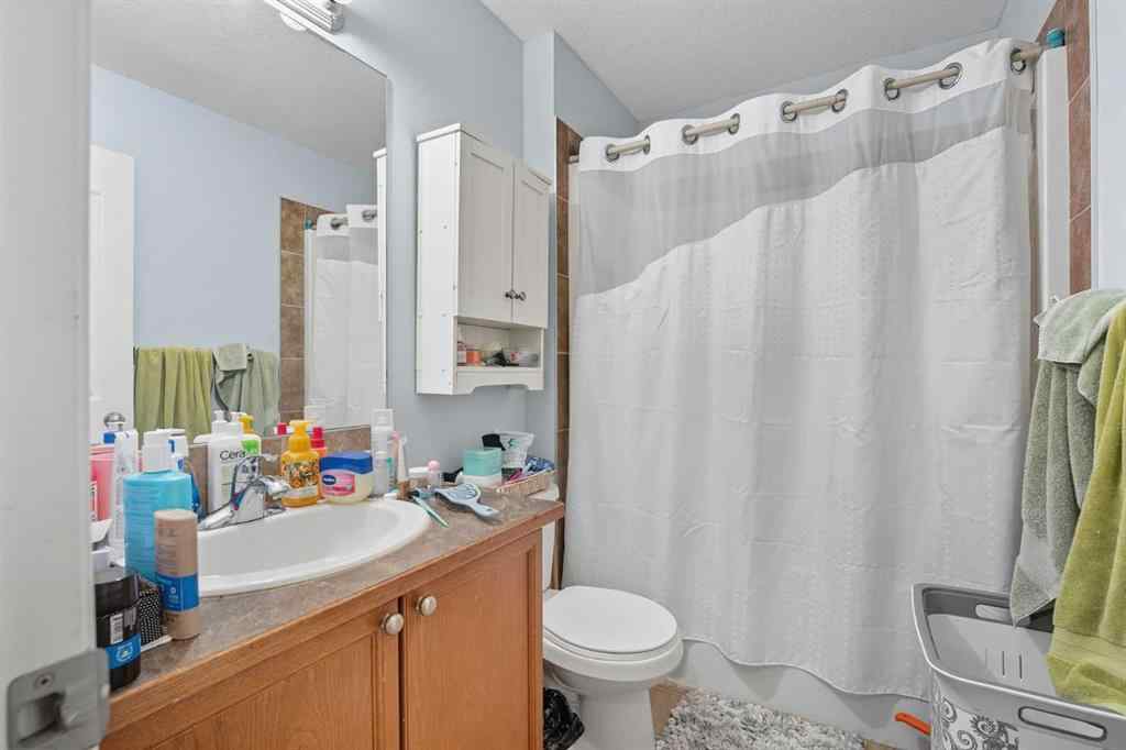 MLS® A2265001 - 824 Luxstone Square SW in Luxstone Airdrie, Residential