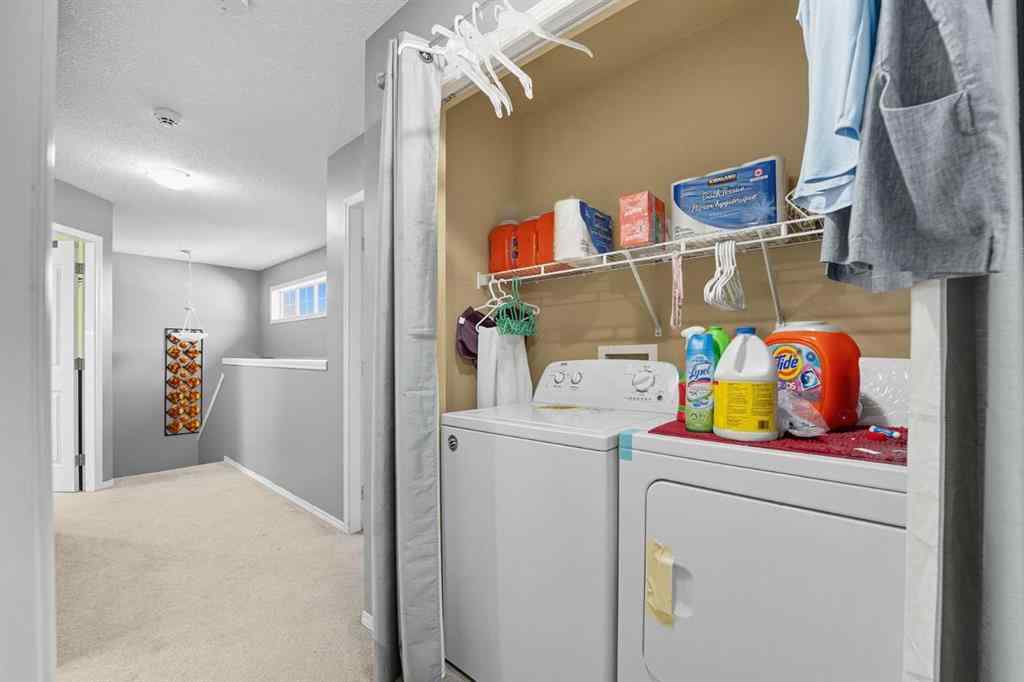 MLS® A2265001 - 824 Luxstone Square SW in Luxstone Airdrie, Residential