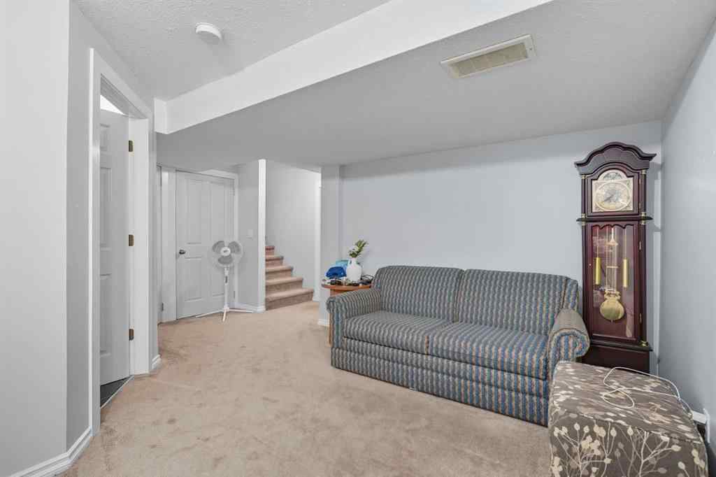 MLS® A2265001 - 824 Luxstone Square SW in Luxstone Airdrie, Residential