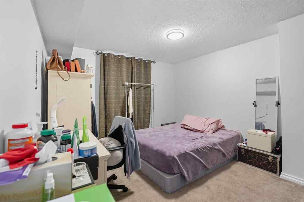 MLS® A2265001 - 824 Luxstone Square SW in Luxstone Airdrie, Residential