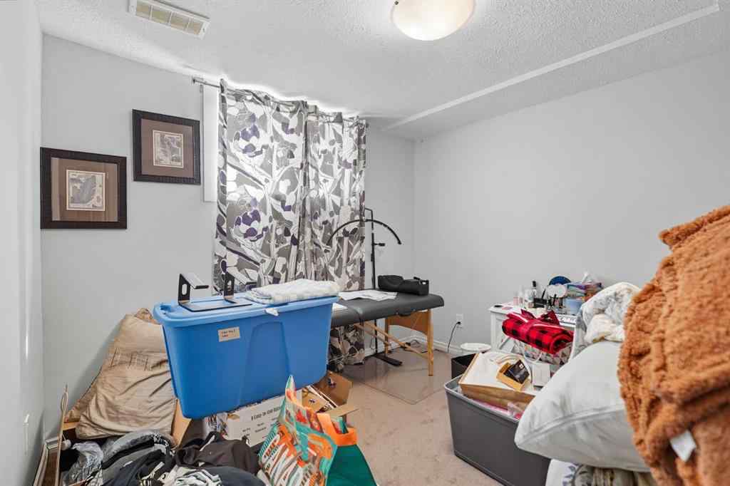 MLS® A2265001 - 824 Luxstone Square SW in Luxstone Airdrie, Residential