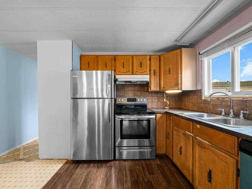 MLS® A2265004 - 102 Burroughs Place NE in Monterey Park Calgary, Mobile