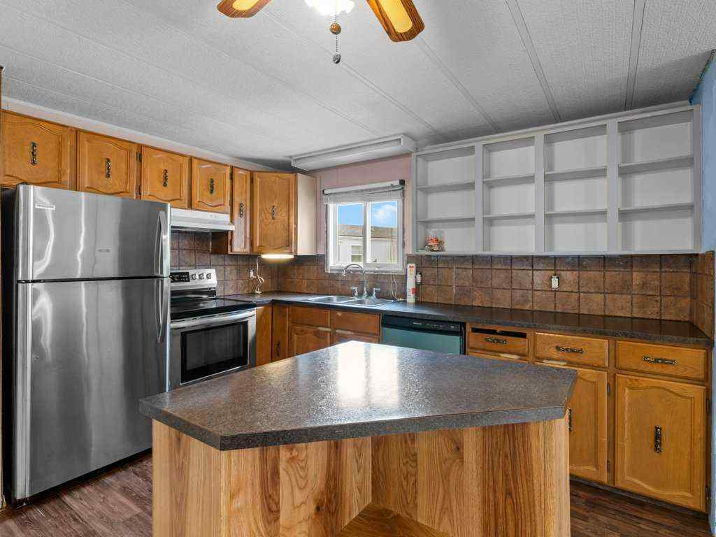 MLS® A2265004 - 102 Burroughs Place NE in Monterey Park Calgary, Mobile