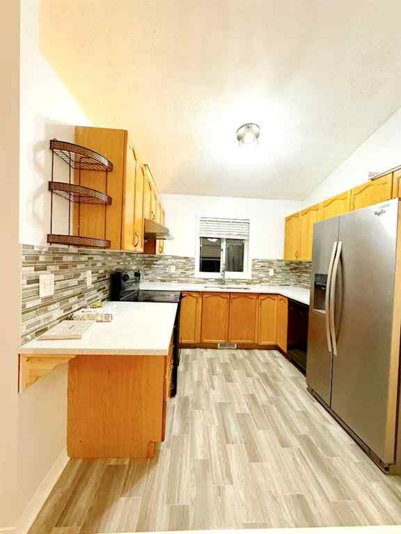 MLS® A2265019 - 54 Taracove Road NE in Taradale Calgary, Residential