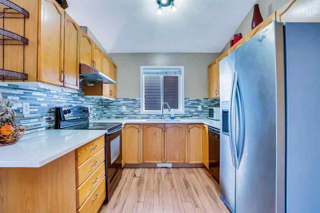 MLS® A2265019 - 54 Taracove Road NE in Taradale Calgary, Residential