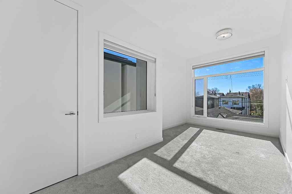 MLS® A2265031 - 2115 Bowness Road NW in West Hillhurst Calgary, Residential