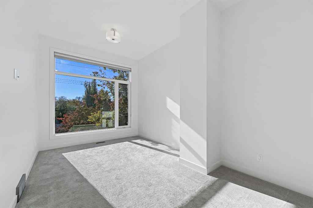 MLS® A2265031 - 2115 Bowness Road NW in West Hillhurst Calgary, Residential