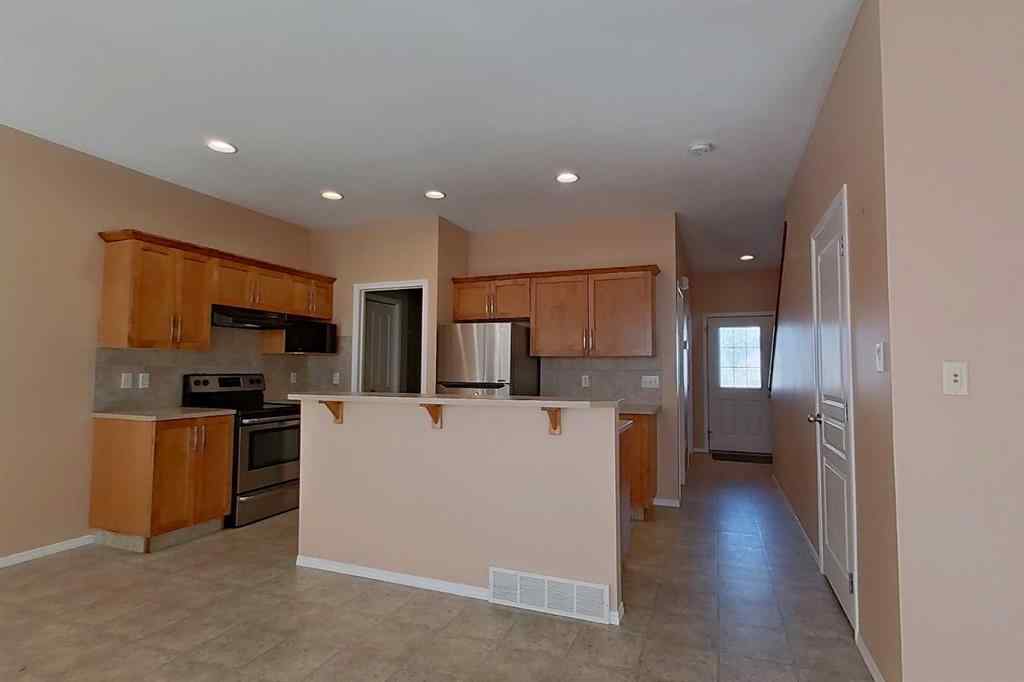 MLS® A2265039 - Unit #4 295 Blackfoot Road W in Indian Battle Heights Lethbridge, Residential