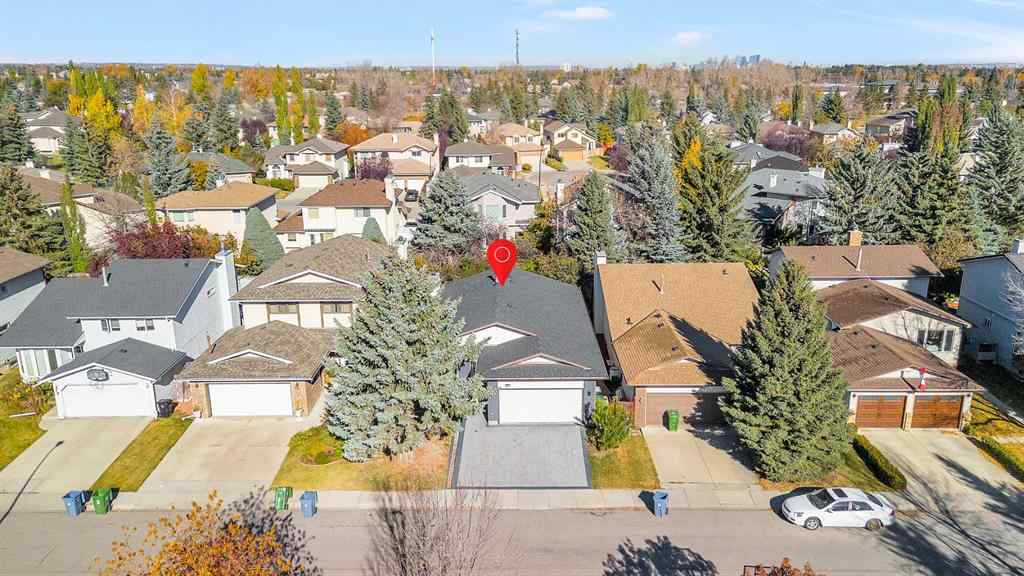 MLS® A2265054 - 64 Woodstock Road SW in Woodlands Calgary, Residential