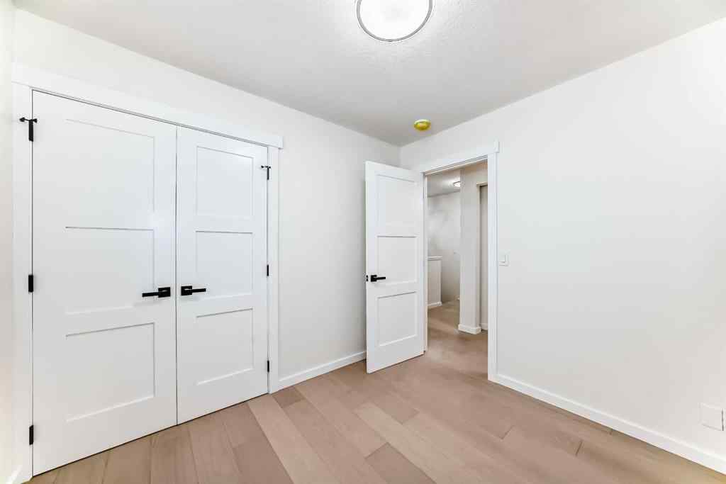 MLS® A2265054 - 64 Woodstock Road SW in Woodlands Calgary, Residential