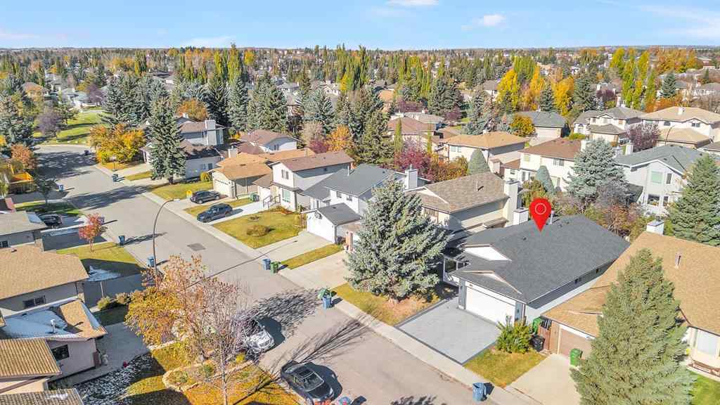 MLS® A2265054 - 64 Woodstock Road SW in Woodlands Calgary, Residential
