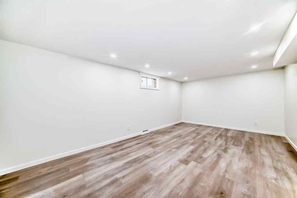 MLS® A2265054 - 64 Woodstock Road SW in Woodlands Calgary, Residential