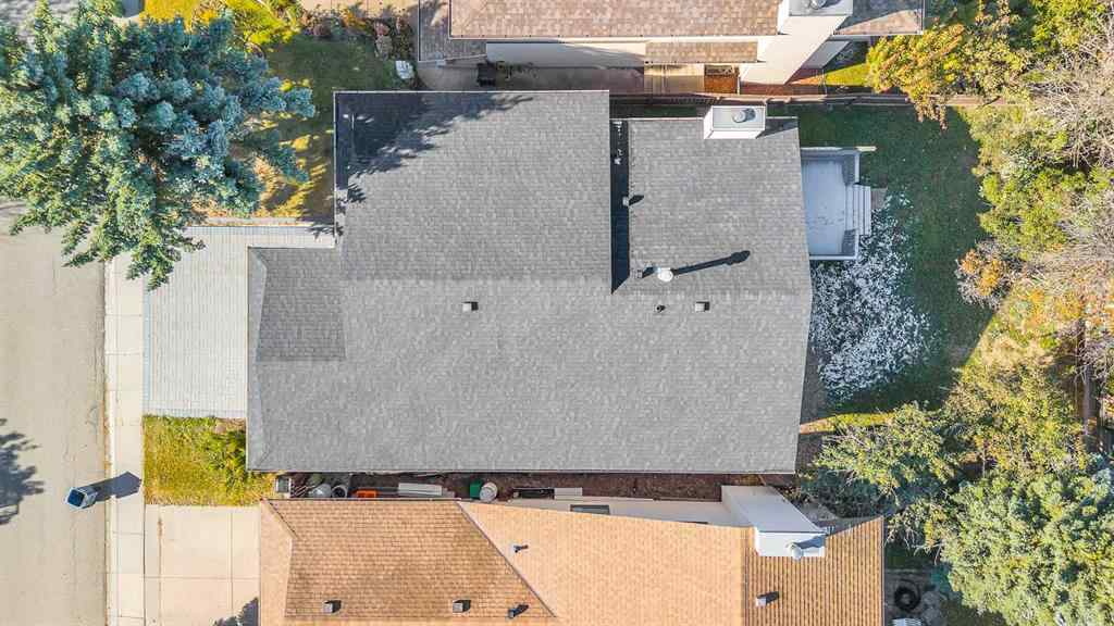 MLS® A2265054 - 64 Woodstock Road SW in Woodlands Calgary, Residential