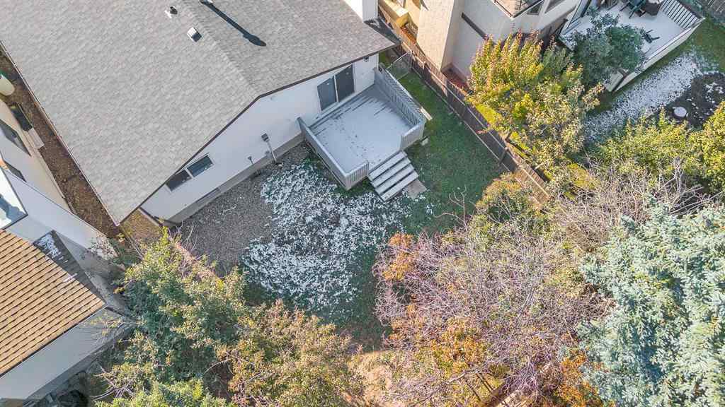 MLS® A2265054 - 64 Woodstock Road SW in Woodlands Calgary, Residential