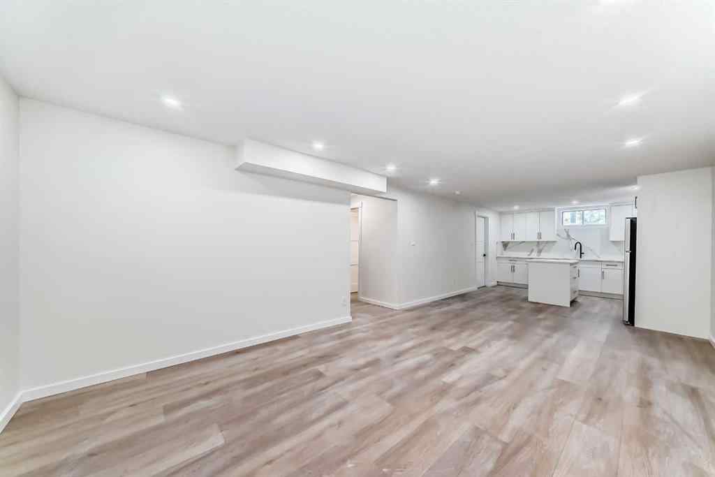 MLS® A2265054 - 64 Woodstock Road SW in Woodlands Calgary, Residential