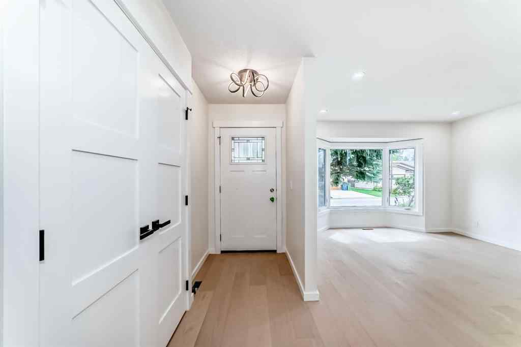 MLS® A2265054 - 64 Woodstock Road SW in Woodlands Calgary, Residential