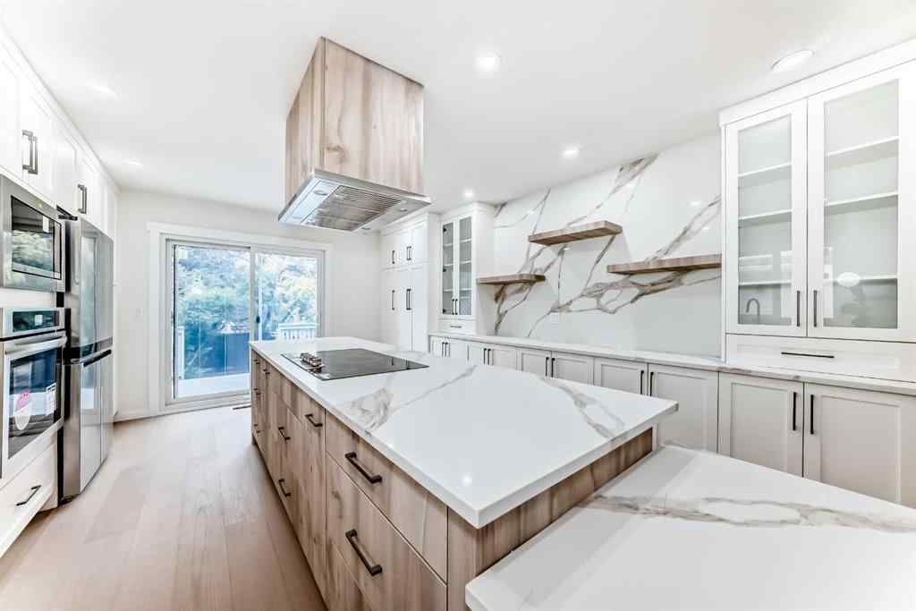 MLS® A2265054 - 64 Woodstock Road SW in Woodlands Calgary, Residential