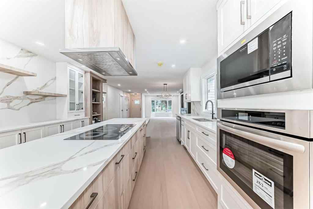 MLS® A2265054 - 64 Woodstock Road SW in Woodlands Calgary, Residential