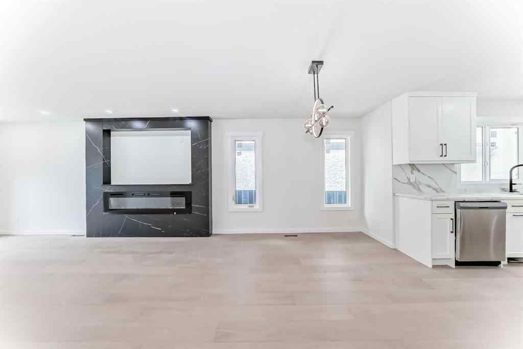 MLS® A2265054 - 64 Woodstock Road SW in Woodlands Calgary, Residential