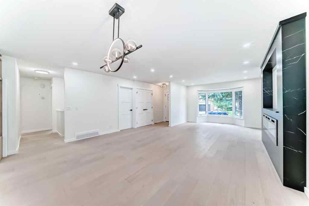 MLS® A2265054 - 64 Woodstock Road SW in Woodlands Calgary, Residential