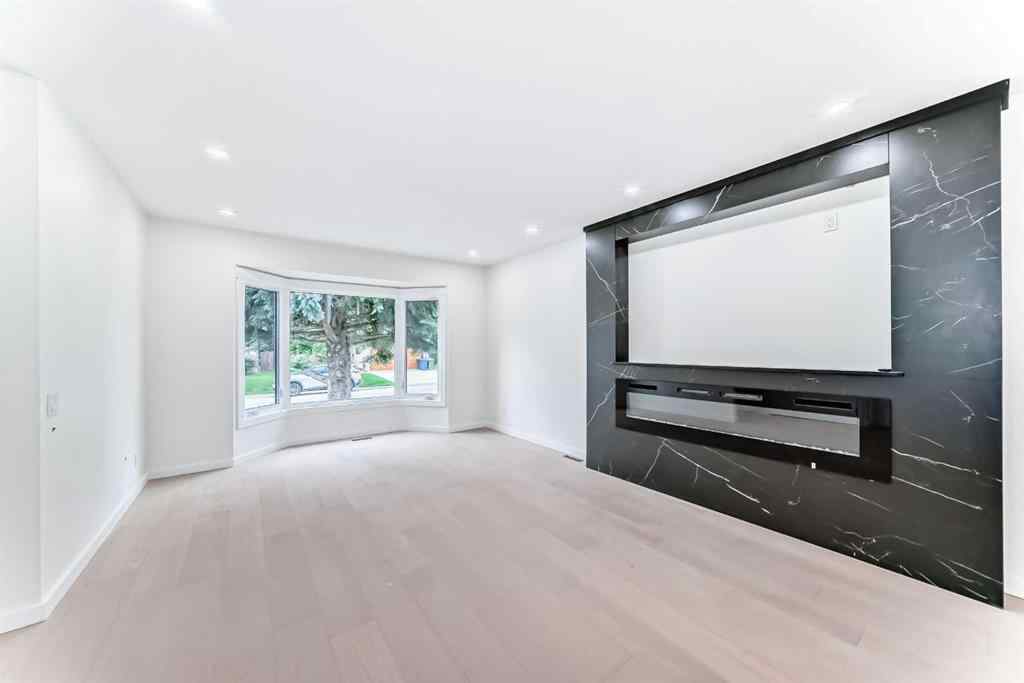 MLS® A2265054 - 64 Woodstock Road SW in Woodlands Calgary, Residential