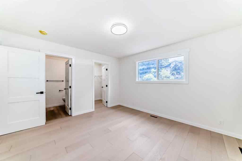 MLS® A2265054 - 64 Woodstock Road SW in Woodlands Calgary, Residential