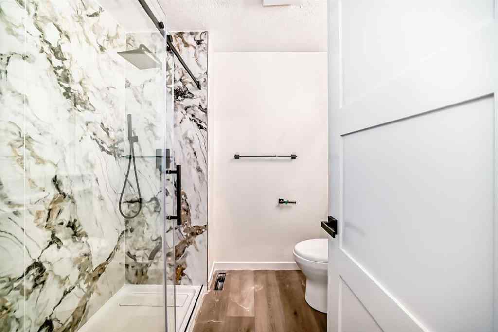 MLS® A2265054 - 64 Woodstock Road SW in Woodlands Calgary, Residential