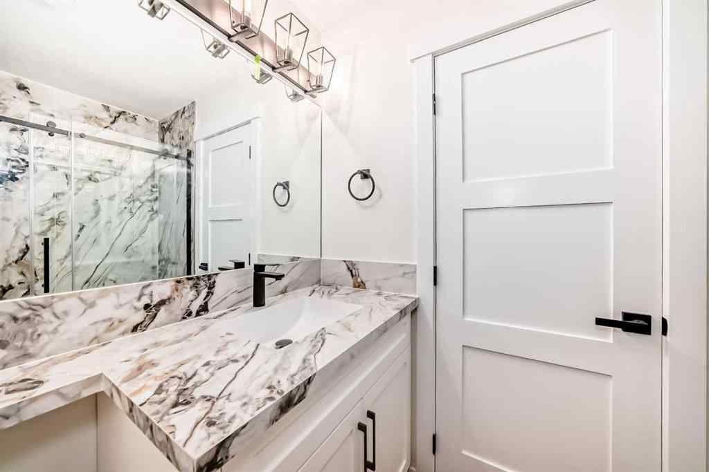 MLS® A2265054 - 64 Woodstock Road SW in Woodlands Calgary, Residential