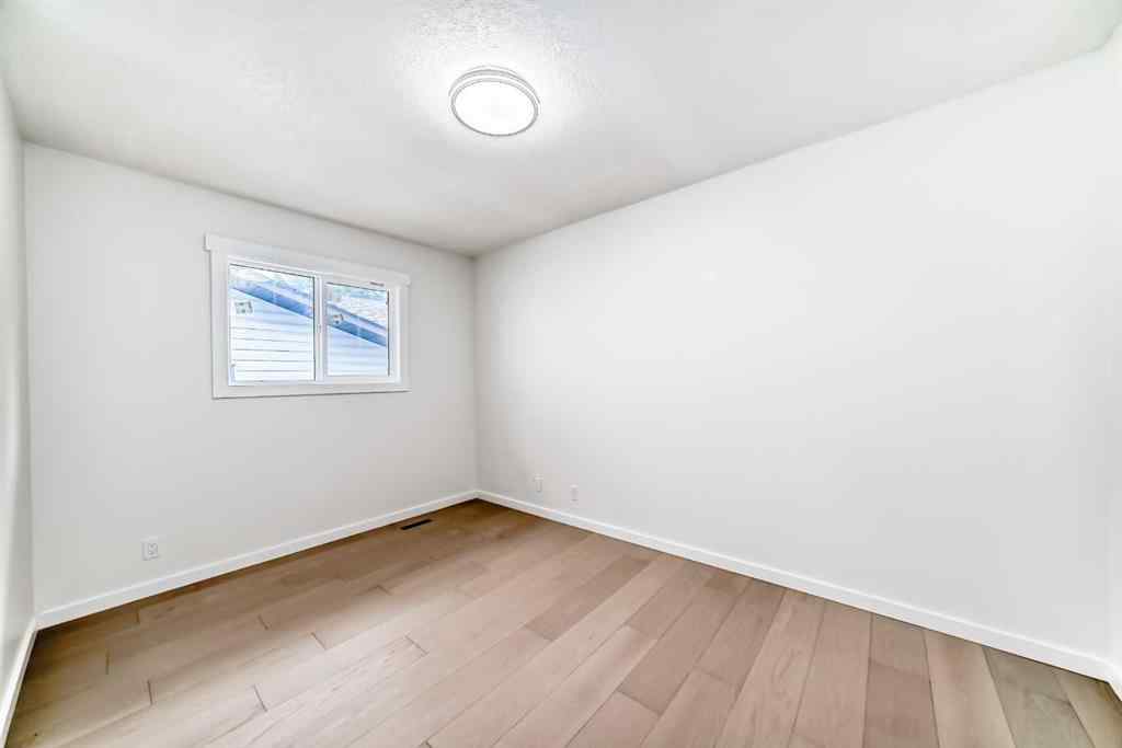 MLS® A2265054 - 64 Woodstock Road SW in Woodlands Calgary, Residential