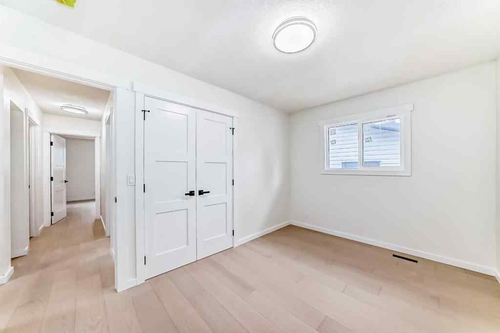 MLS® A2265054 - 64 Woodstock Road SW in Woodlands Calgary, Residential