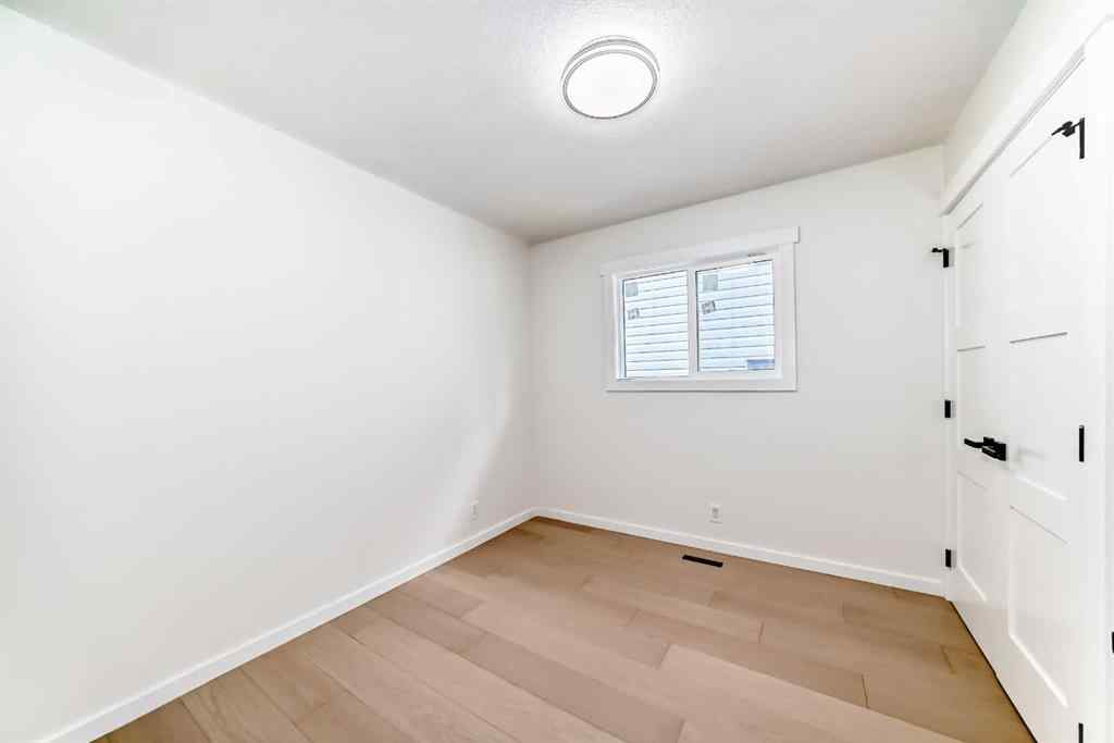 MLS® A2265054 - 64 Woodstock Road SW in Woodlands Calgary, Residential