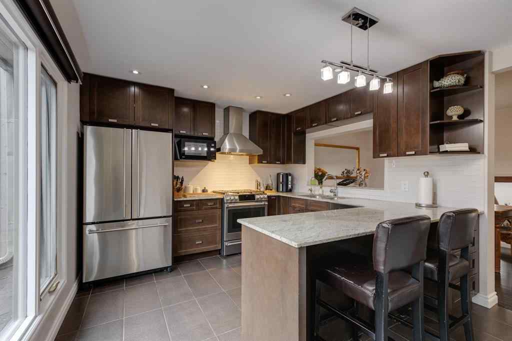 MLS® A2265055 - 3841 Point Mckay Road NW in Point McKay Calgary, Residential