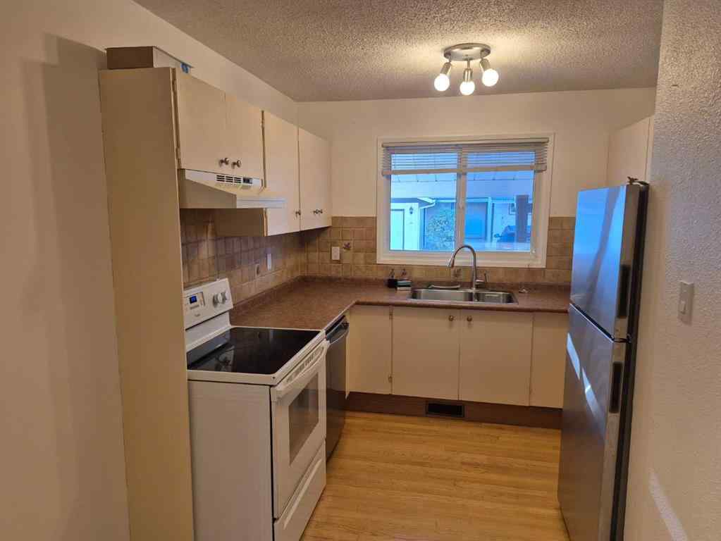 MLS® A2265057 - Unit #1 20 Laval Boulevard W in Varsity Village Lethbridge, Rental