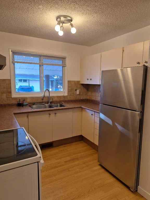 MLS® A2265057 - Unit #1 20 Laval Boulevard W in Varsity Village Lethbridge, Rental