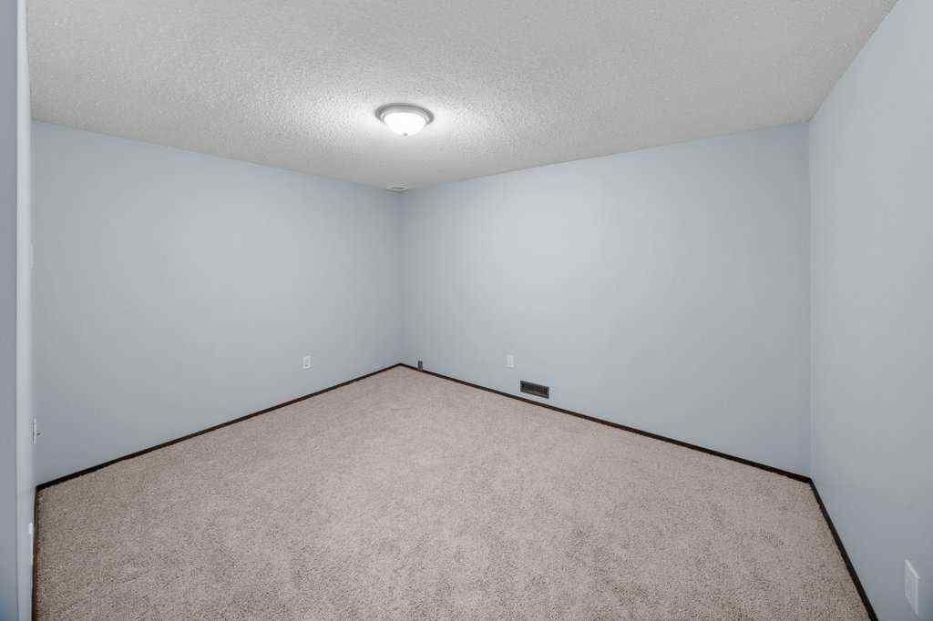 MLS® A2265065 - 108 Woodborough Crescent SW in Woodbine Calgary, Residential