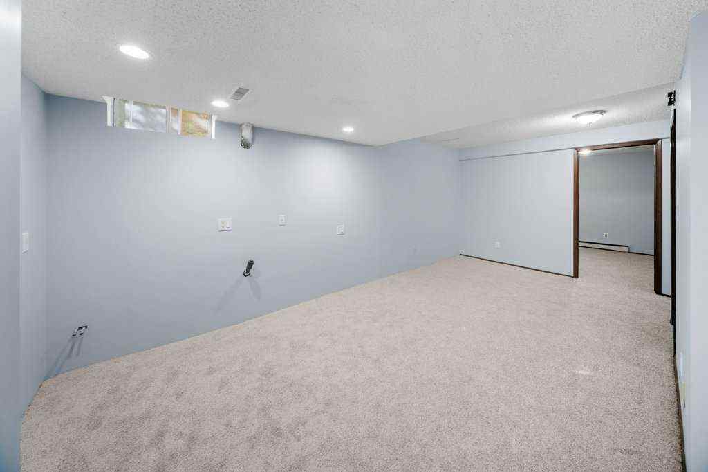 MLS® A2265065 - 108 Woodborough Crescent SW in Woodbine Calgary, Residential