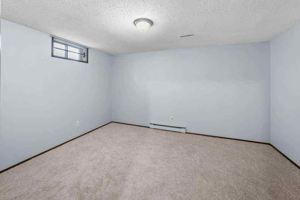 MLS® A2265065 - 108 Woodborough Crescent SW in Woodbine Calgary, Residential