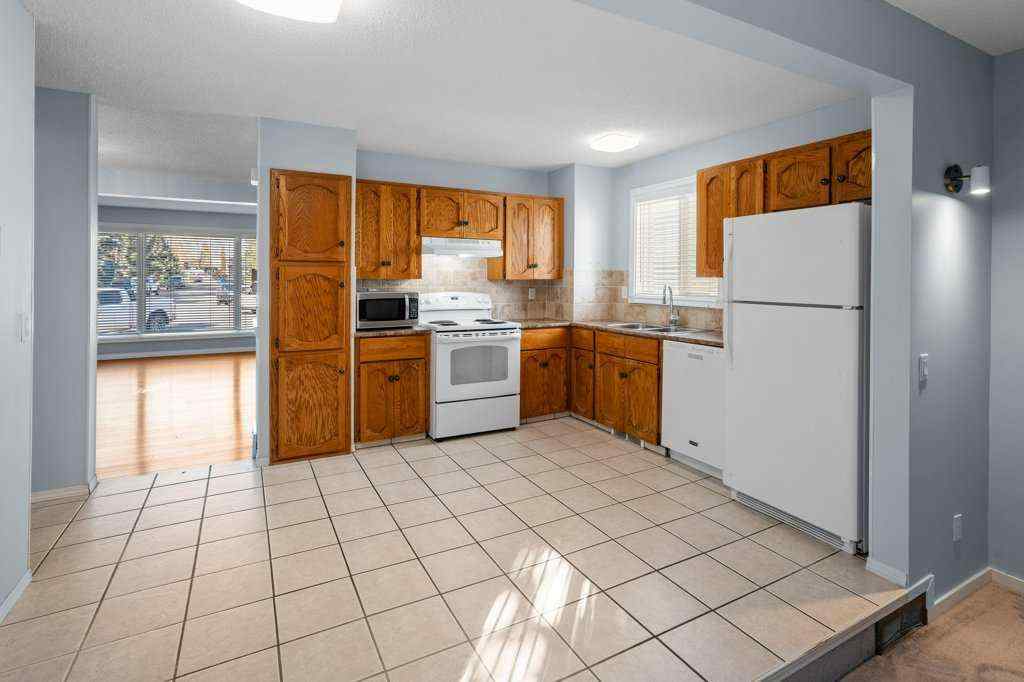 MLS® A2265065 - 108 Woodborough Crescent SW in Woodbine Calgary, Residential