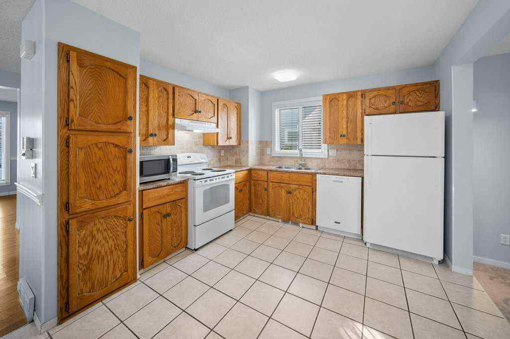 MLS® A2265065 - 108 Woodborough Crescent SW in Woodbine Calgary, Residential